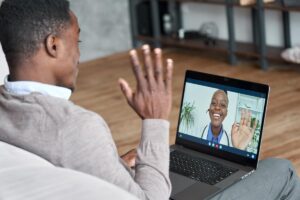 a patient and provider explore the features of behavioral health telehealth