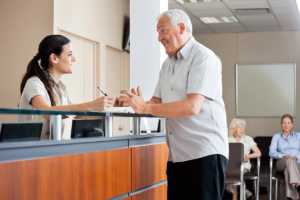 a nurse talks to a patient about how emr can enhance patient safety